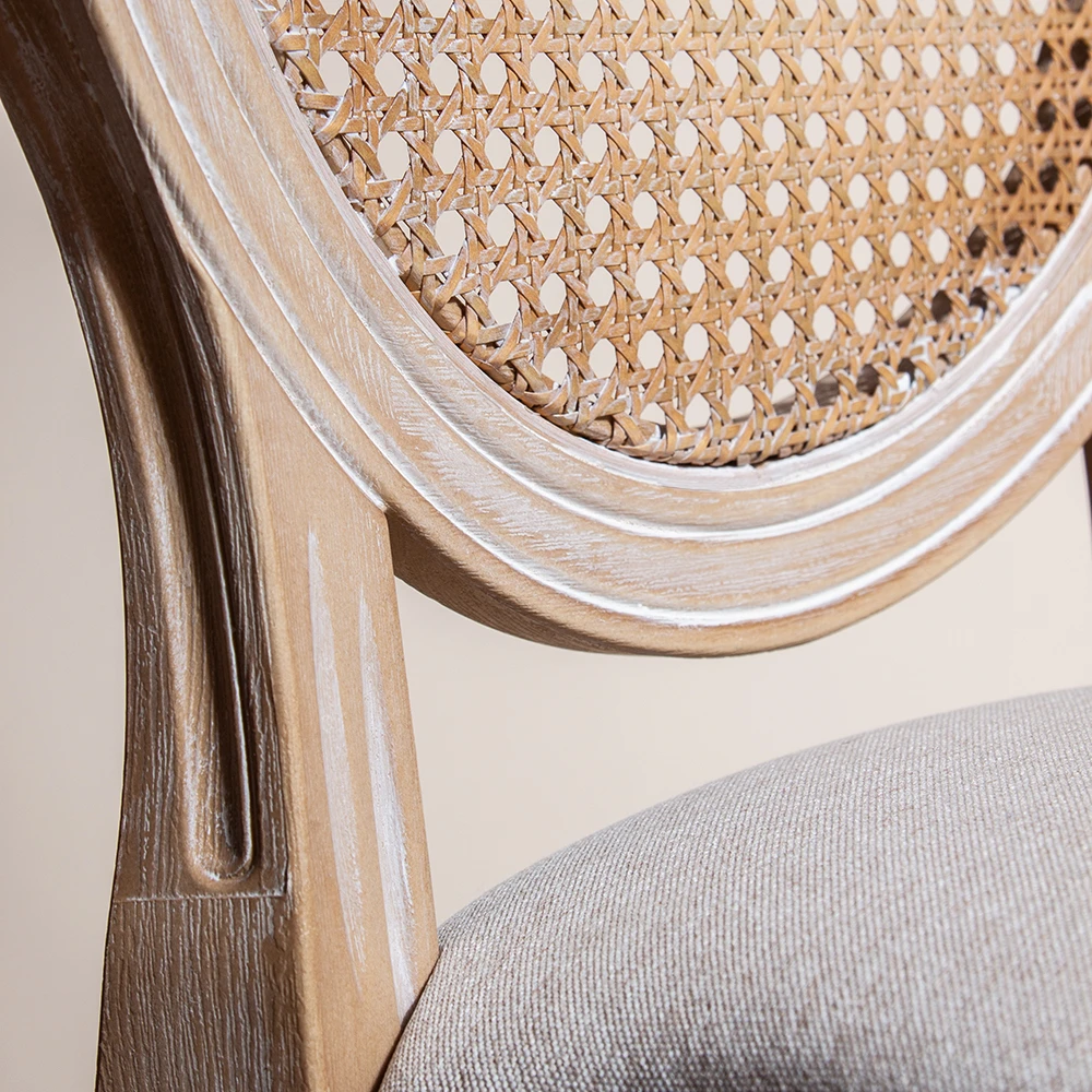 Sedia Louis color lime con schienale in rattan