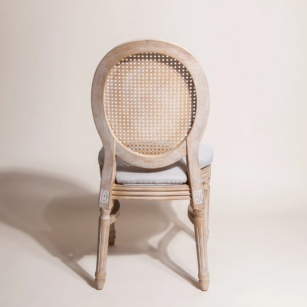 Sedia Louis color lime con schienale in rattan