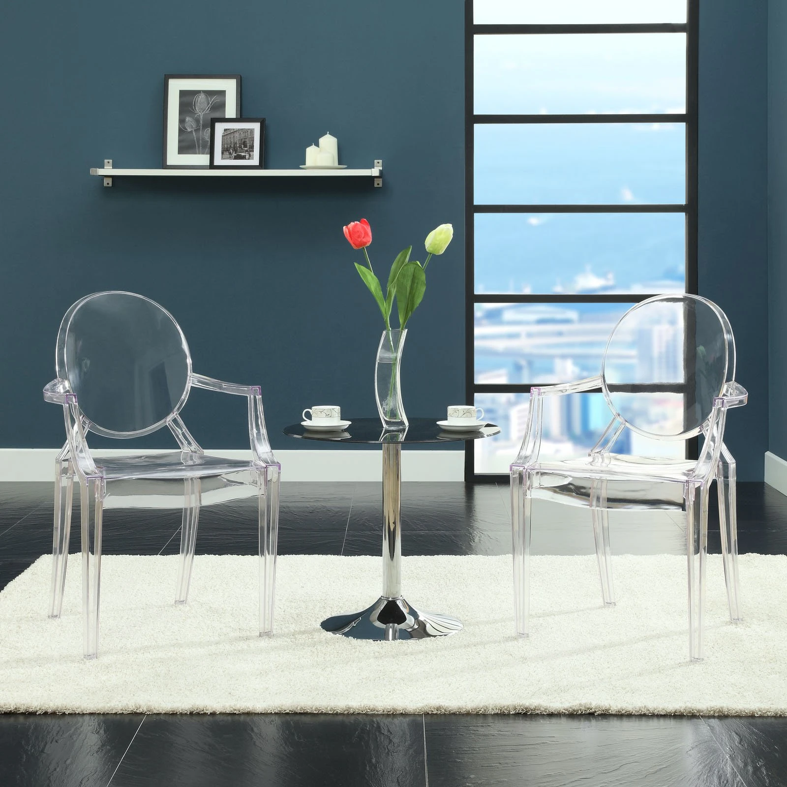 Sedia Ghost in resina trasparente con braccioli